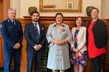 Dame Cindy with the official party