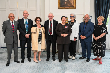 Dame Cindy and Dr Davies with the official party