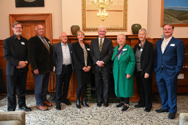 Dr Davies with the official party from the Moths and Butterflies of NZ Trust