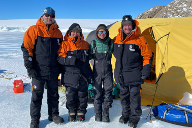 Dr Jordy Hendrikx, Dame Cindy, Dr Sarah Seabrook, and Dr Davies on the ice in front of technical tent.