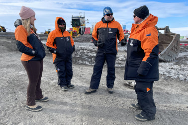 Abigail Richards, Dame Cindy, Professor Jordy Hendrikx, and Dr Davies hearing about the Scott Base redevelopment on the site.