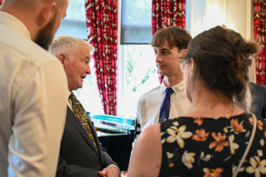Dr Davies speaks with members of the Boys' Brigade