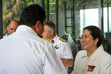 Dame Cindy speaks with a member of the Royal New Zealand Navy