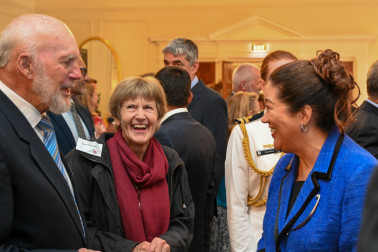 Dame Cindy speaks with guests at the Life Flight reception