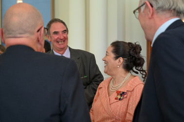 Dame Cindy speaks with guests