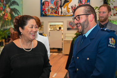 Dame Cindy with a guest at the emergency services reception