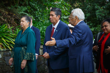 Kuia Pauline Hopa and Kaumātua Joe Harawira guide President Whipps through the pōwhiri process