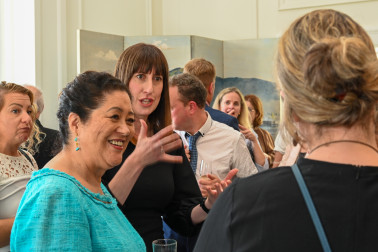 Dame Cindy speaks with guests