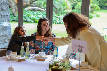 Dame Cindy meeting the family of recipients