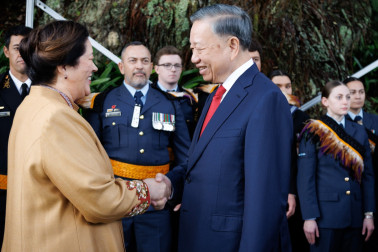 Dame Cindy greets President Lâm
