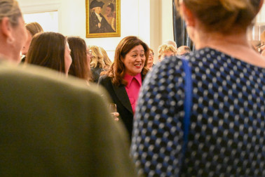 Dame Cindy speaks with guests
