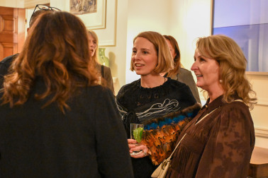 Dame Cindy speaks with guests