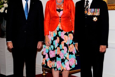 The Governor-General and Rt Hon John Key greet Hon Anne Tolley upon entrance.