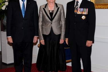 The Governor-General and Rt Hon John Key greet Hon Kate Wilkinson upon entrance.