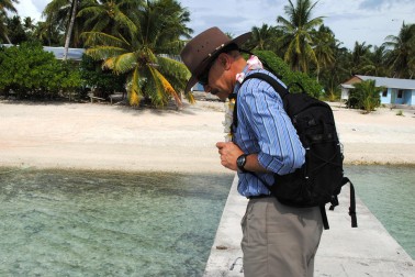 The Governor-General looks at local marine life on the atoll.