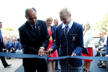 The Governor-General cuts the ribbon to officially open the new Preparatory School at St Andrew's.