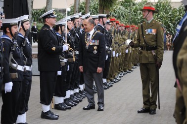 The Governor-General speaks with a member of the Tri-Service Royal Guard of Honour.