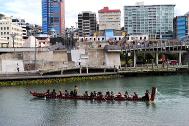 The Waka Taua Team come alongside at the Wharewaka Lagoon.