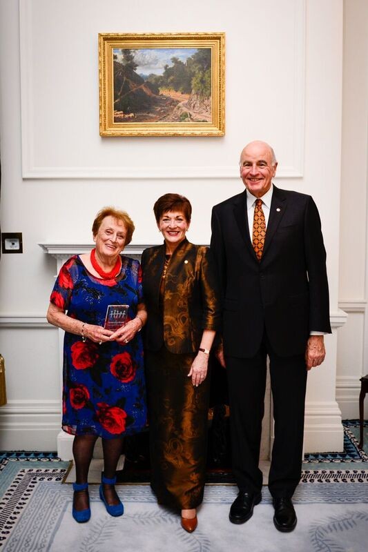 An image of Mrs Inge Woolf, QSO with Dame Patsy and Sir David