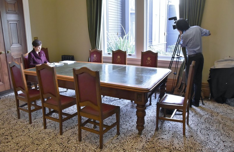 Image of Dame Patsy being filmed in the Council Room at Government House