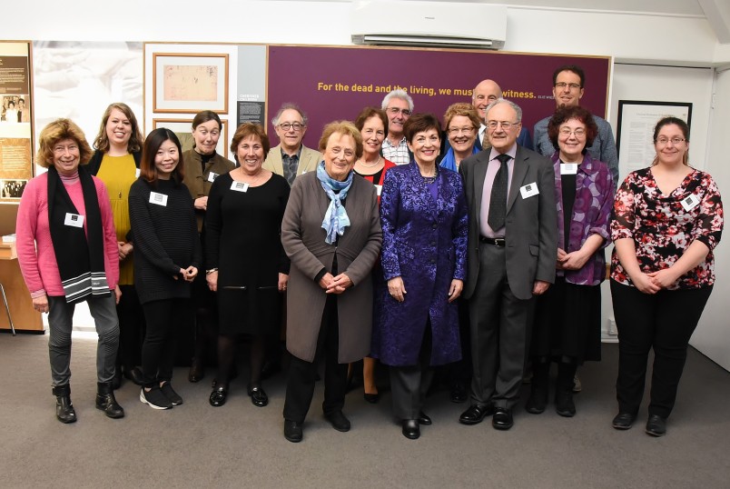 An image of Sir David and Dame Patsy with staff and volunteers
