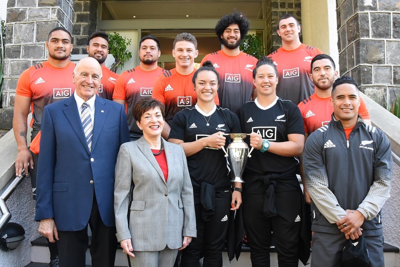 Image of Dame Patsy and Sir David with All Blacks and Black Ferns
