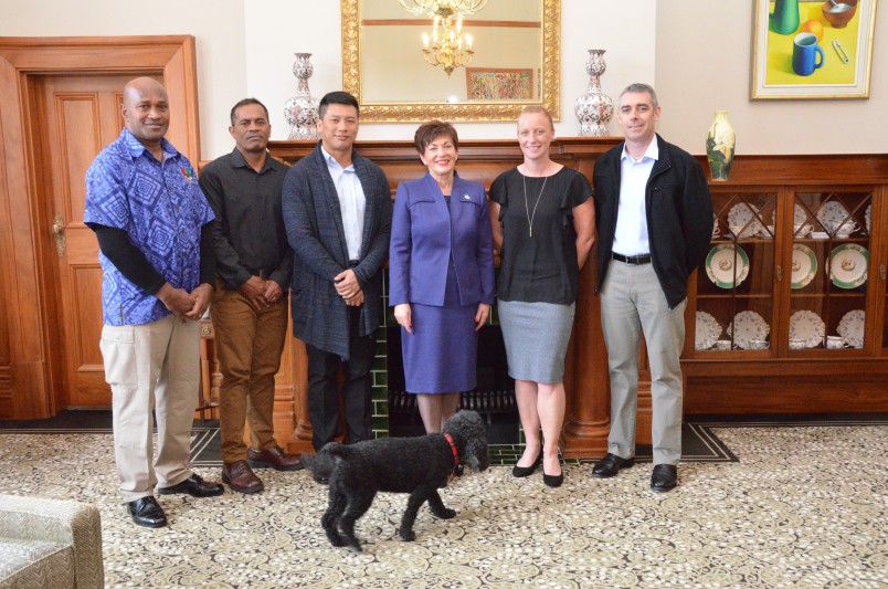 Image of Dame Patsy with a group of Warrant Officers from Tonga, Fiji, Singapore and Australia 