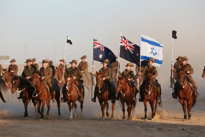 an image of Light Horse re-enactment with Australian, NZ and Israeli flags