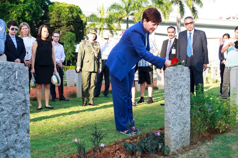 an image of Dame Patsy paying respects