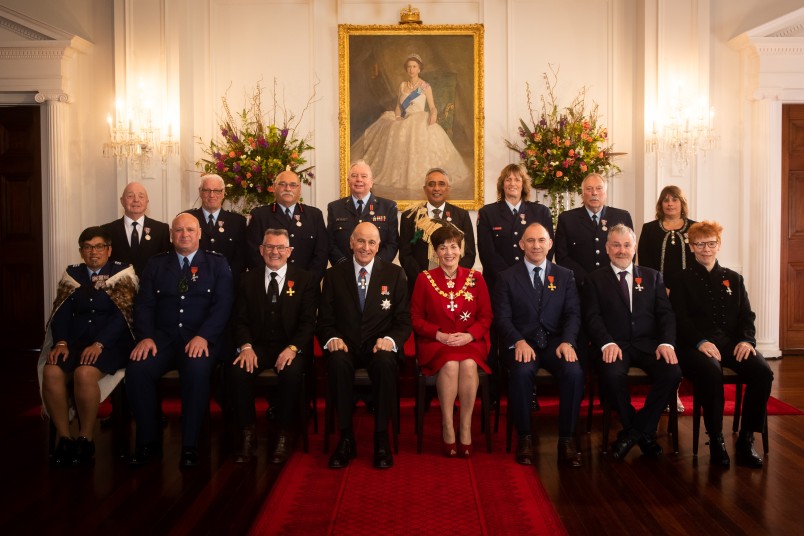 Their Excellencies with the 14 honours recipients