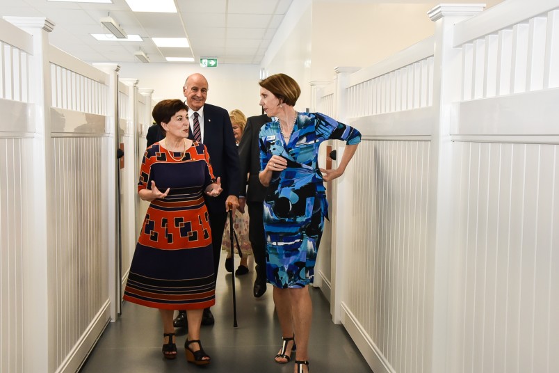 Dame Patsy and Sir David touring the Doggy Day-care Centre