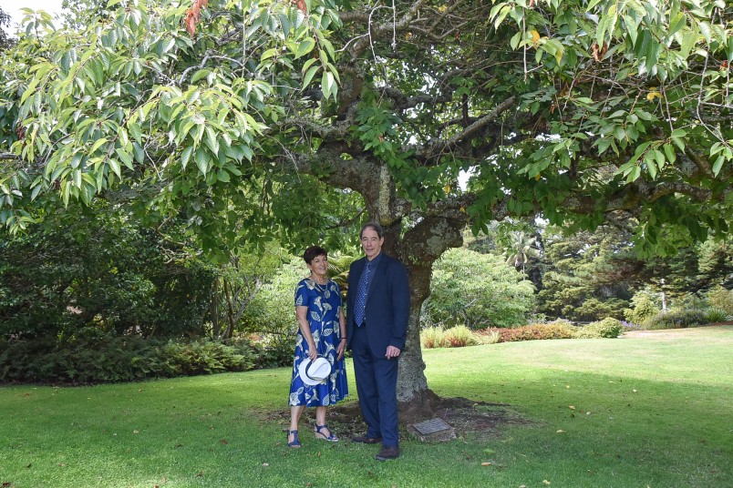 Dame Patsy and Sir Jonathon Porritt with a tree planted by his father, Governor-General Sir Arthur Porritt