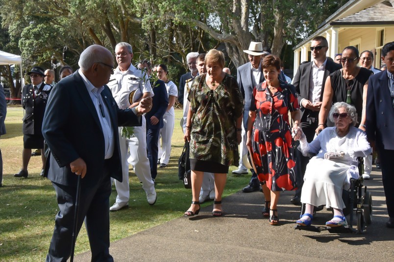 Kaumatua Sir John Clarke leads the official party forward