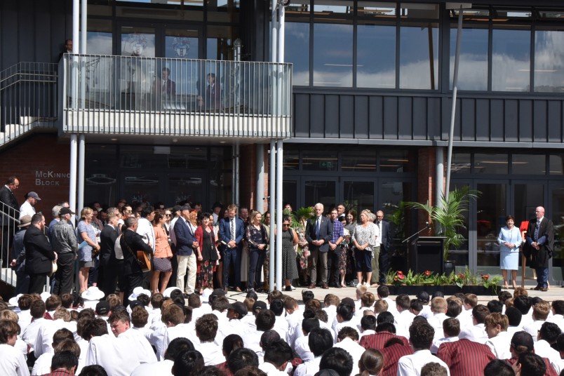 Image of Scots College staff singing