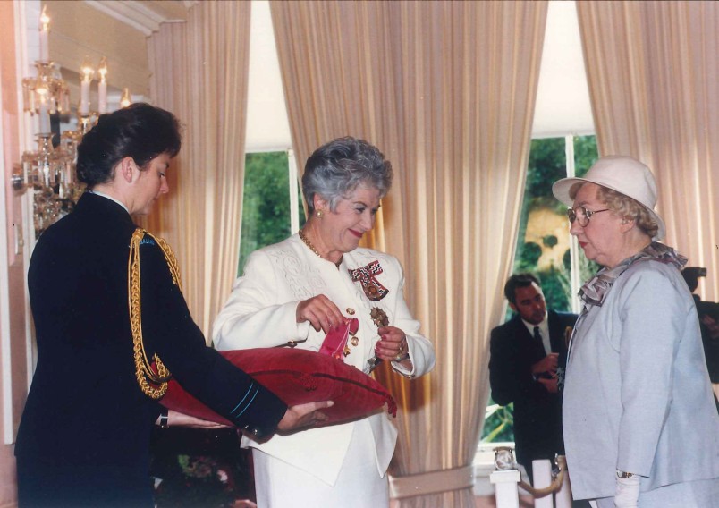 Dame Cath Tizard hosting an investiture ceremony