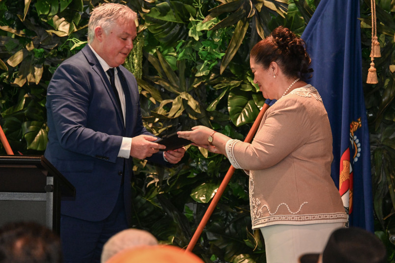 Dame Cindy receiving the signed accord from Hon Mark Mitchell