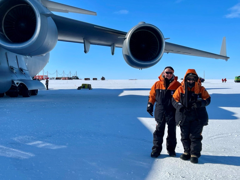 Dr Davies and Dame Cindy with the American C-17 upon arrival on the ice.
