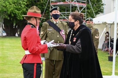 Dame Cindy Kiro presents the Sword of Honour to Elese Russell