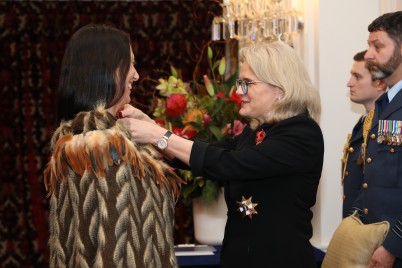 Dame Helen Winkelmann presents Jacinta Ruru her insignia