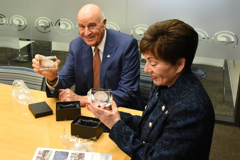 Image of Dame Patsy and Sir David receiving a gift