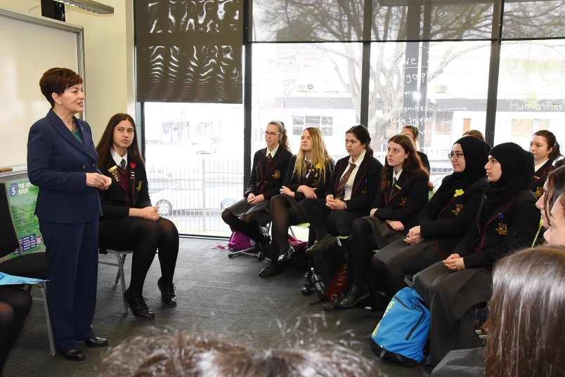 an image of Dame Patsy answering questions from senior students