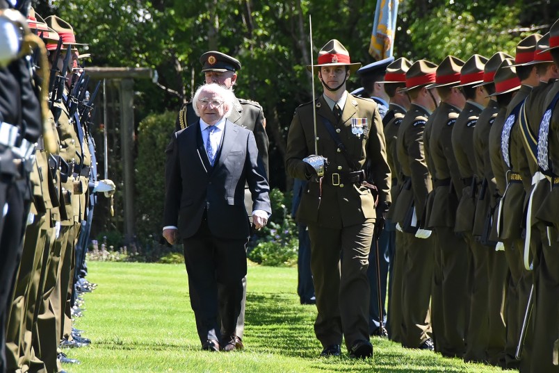 Image of the president of Ireland, Michael D. Higgins inspecting the honour guard