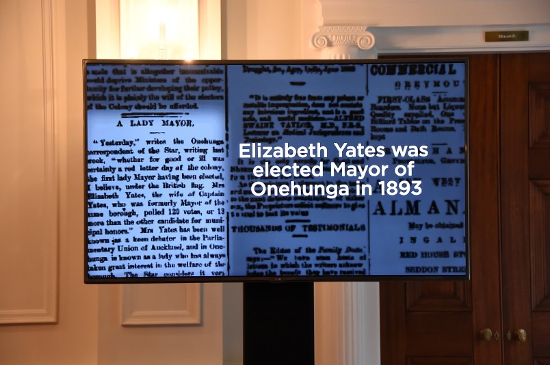 Image of a big screen showing footage of New Zealand's (and the British Empire's) first female mayor, Elizabeth Yates