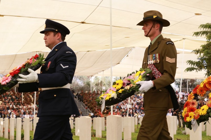 an image of wreaths from New Zealand and Australia at the Anzac Service