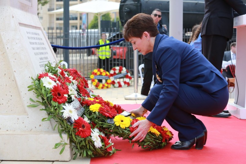 an image of Dame Patsy laying a wreath at the Turkish service at the Ataturk Memorial