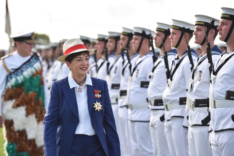 an image of Dame Patsy inspecting Navy personnel