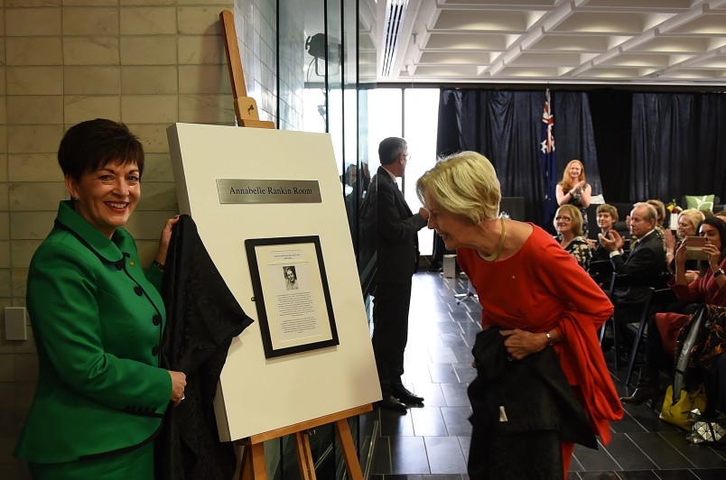Image of Dame Quentin taking a closer look at the plaque