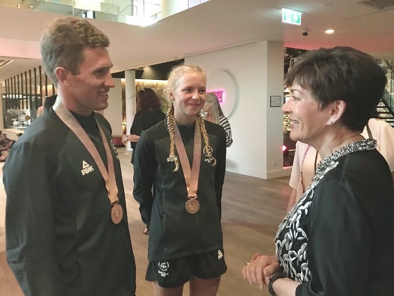 Image of Dame Patsy with Triathlon Mixed team bronze medallists Ryan Sisson and Nicole van der Kaay