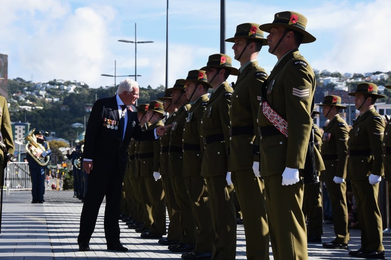 an image of The Hon Justice Sir William Young inspecting the Guard of Honour