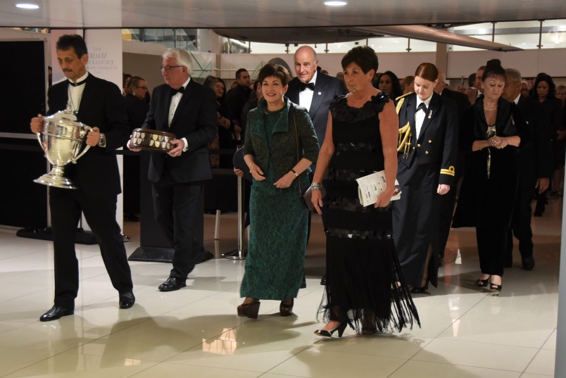 an image of The official party entering the venue with the Ahuwhenua Trophy